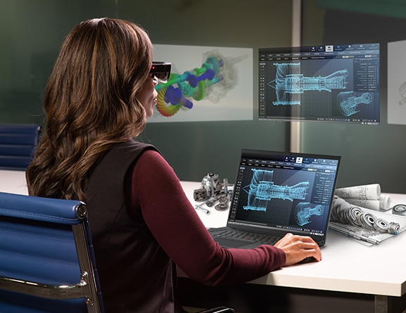 Personne utilisant un casque VR avec la station de travail mobile Lenovo ThinkPad P1 Gen 5 avec moniteurs virtuels.