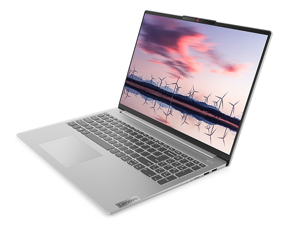 Vue latérale droite du portable IdeaPad Slim 5 Gen 8, montrant le clavier et une photo de paysage à l’écran