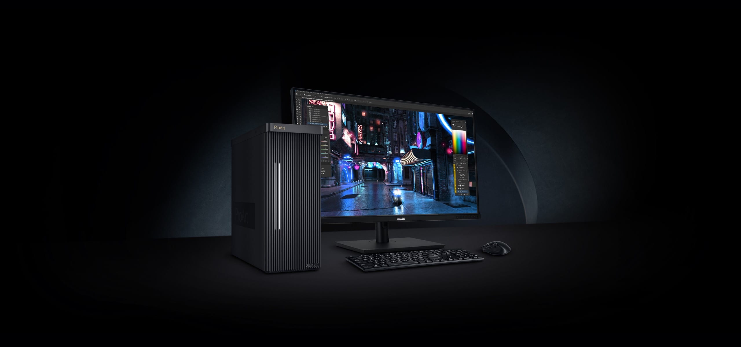 A ProArt Station PD500TE connected to a ProArt Display, a graphic design program can be seen onscreen.