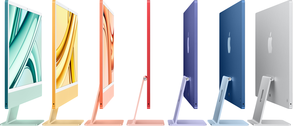 Vue de côté de plusieurs iMac alignés l'un derrière l'autre, face tournée vers la droite, en vert, jaune, orange, rose, mauve, bleu et argent.